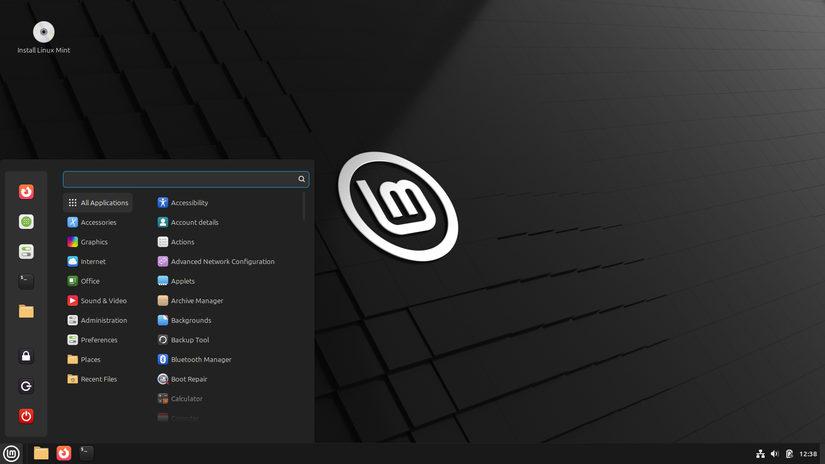 Linux Mint live desktop showing launcher menu.