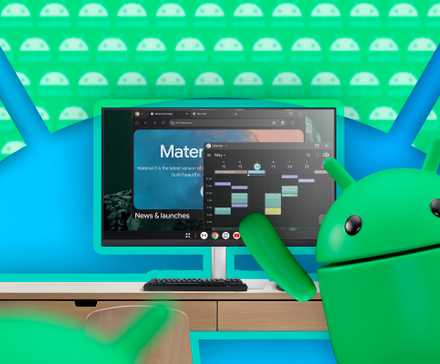 A desktop with the Android screen and the Android mascot next to it waving.-1