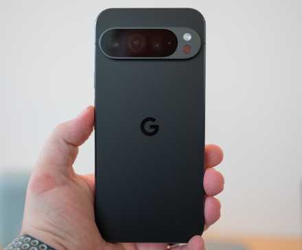 A person holding the Google Pixel 9 Pro smartphone. 